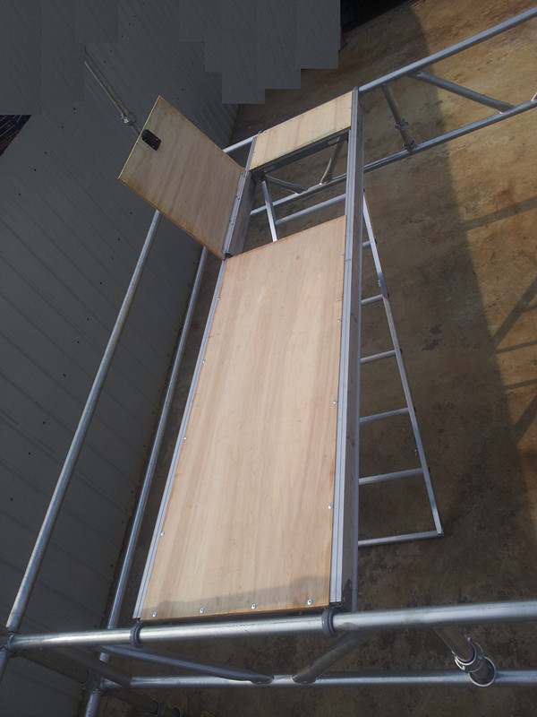 Aluminum plywood deck with trapdoor and ladder